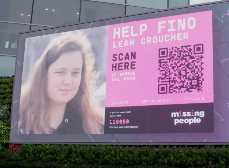 roadside billboard with QR code
